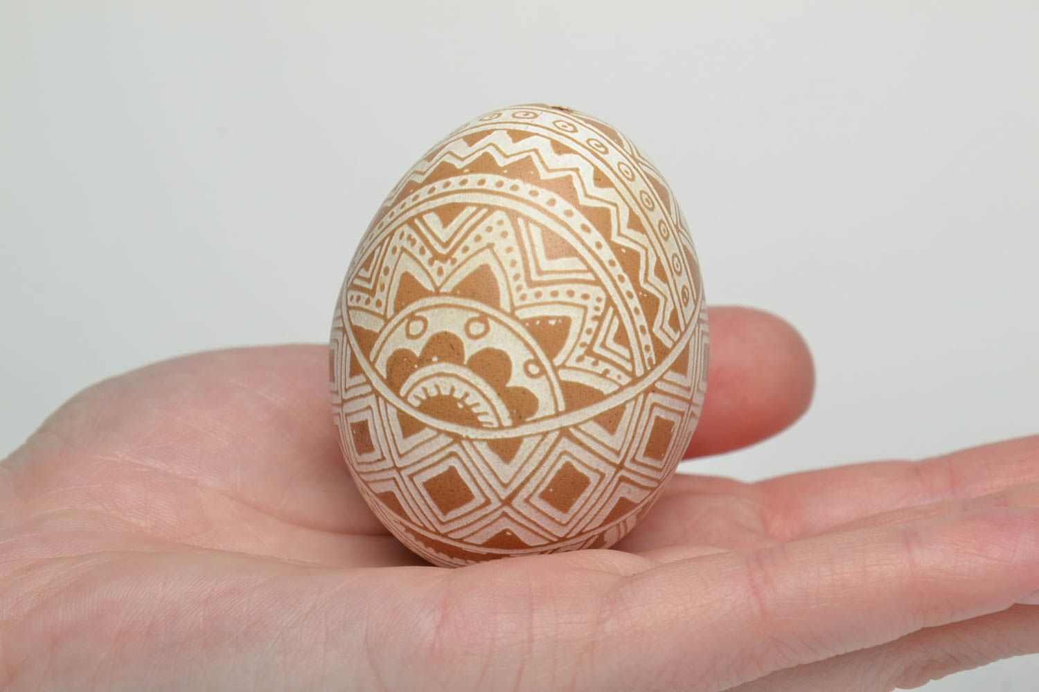 Easter egg with traditional Ukrainian symbolics made using vinegar etching technique photo 4
