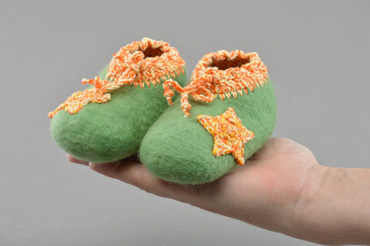 Handmade designer felted wool light green baby booties with crocheted edges photo 4