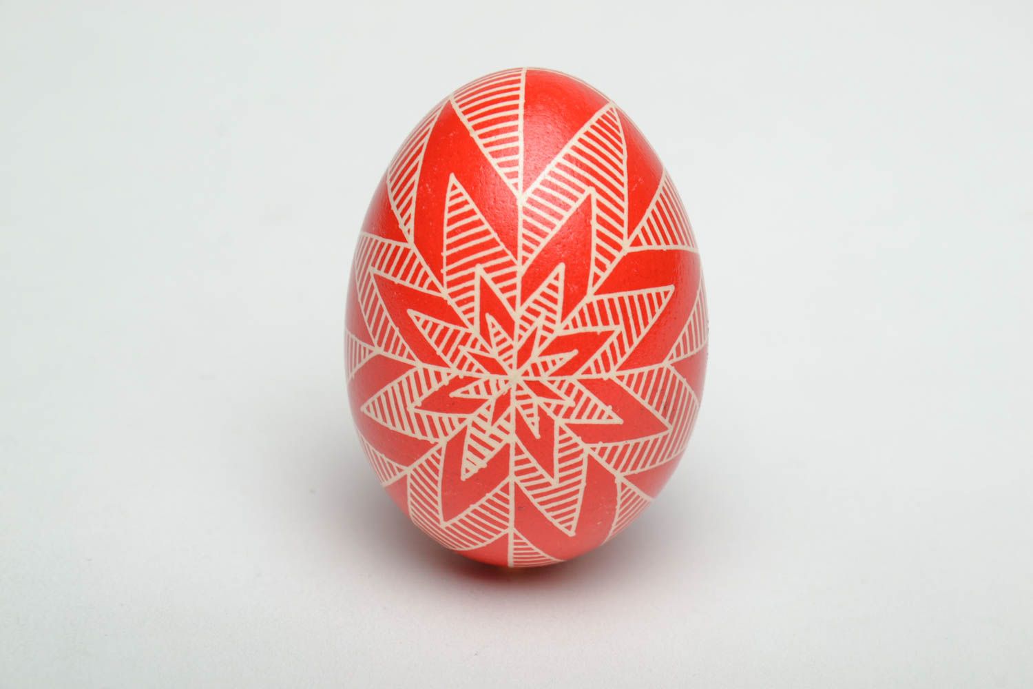 Painted chicken egg of red color photo 2