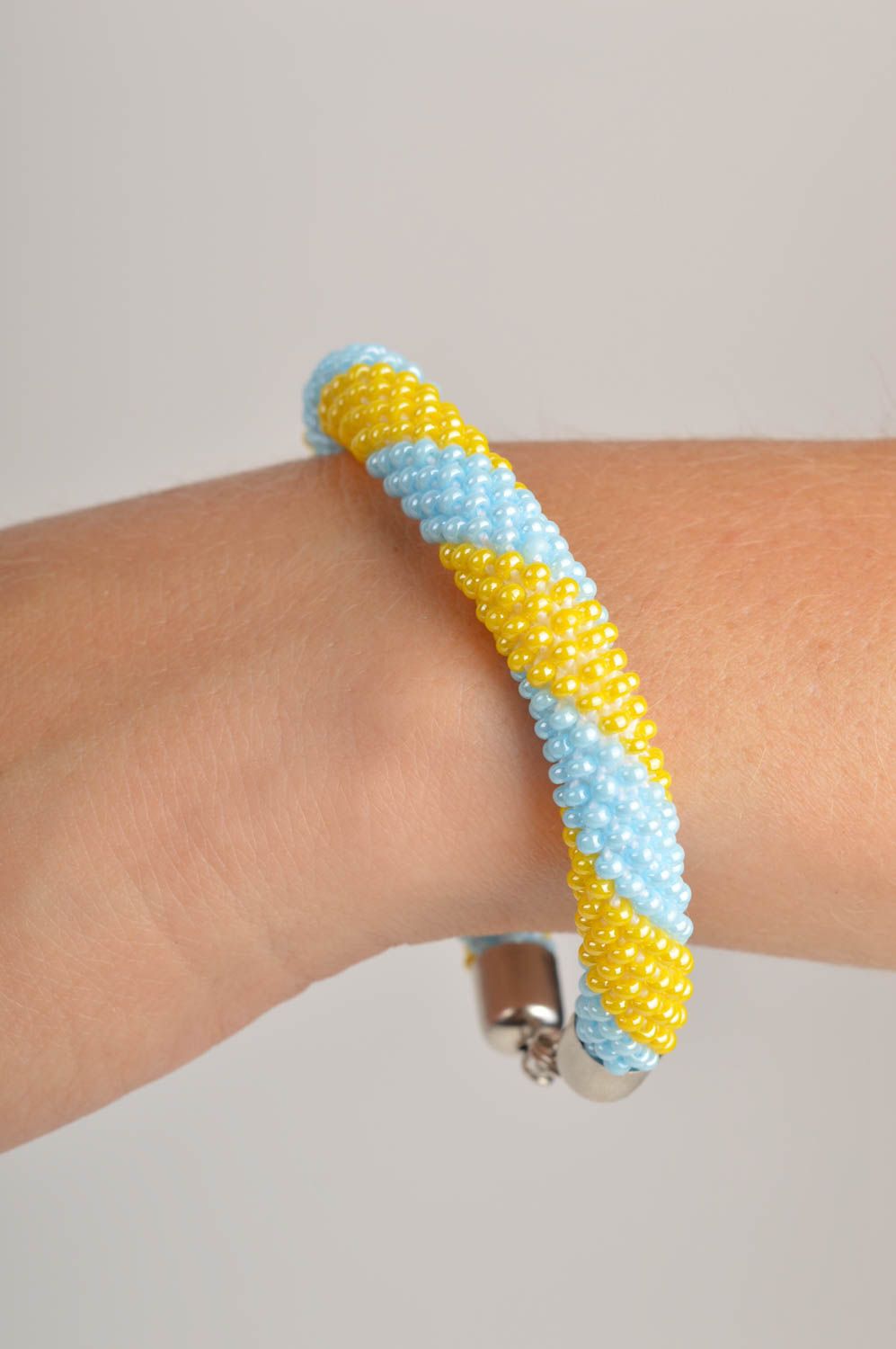 Homemade cord made of Czech beads adjustable bracelet in yellow and blue color photo 5