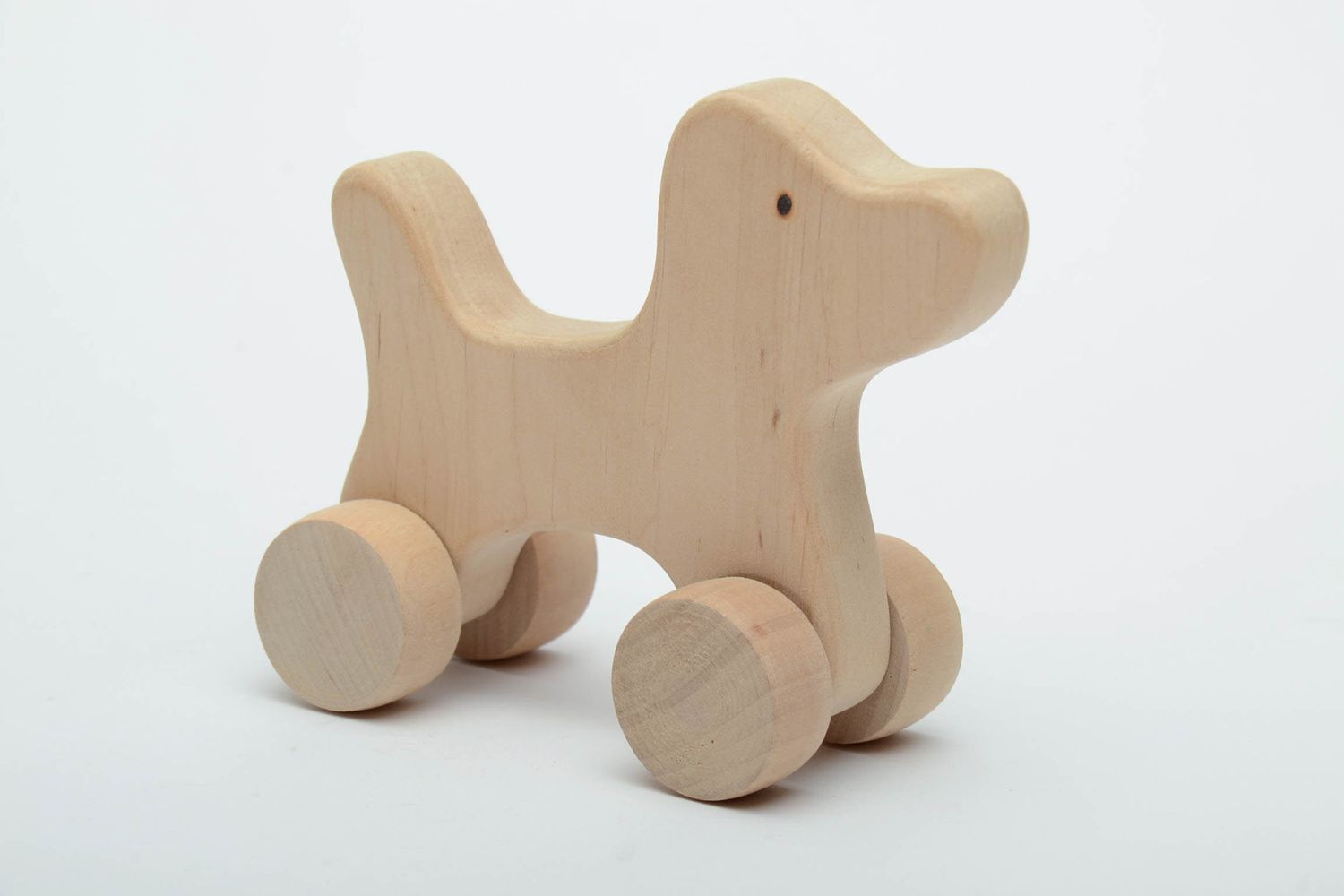 Wooden wheeled toy Dog photo 2