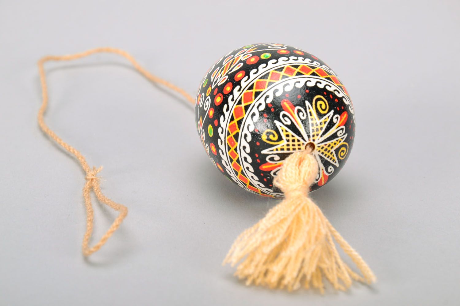 Painted egg with a tassel photo 4