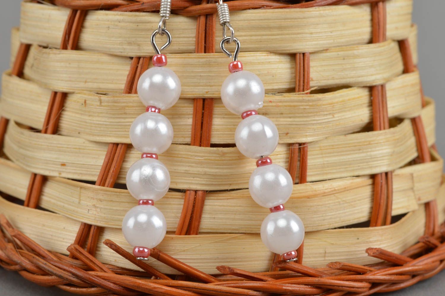 Handmade female earrings festive white beaded jewelry stylish accessories photo 1