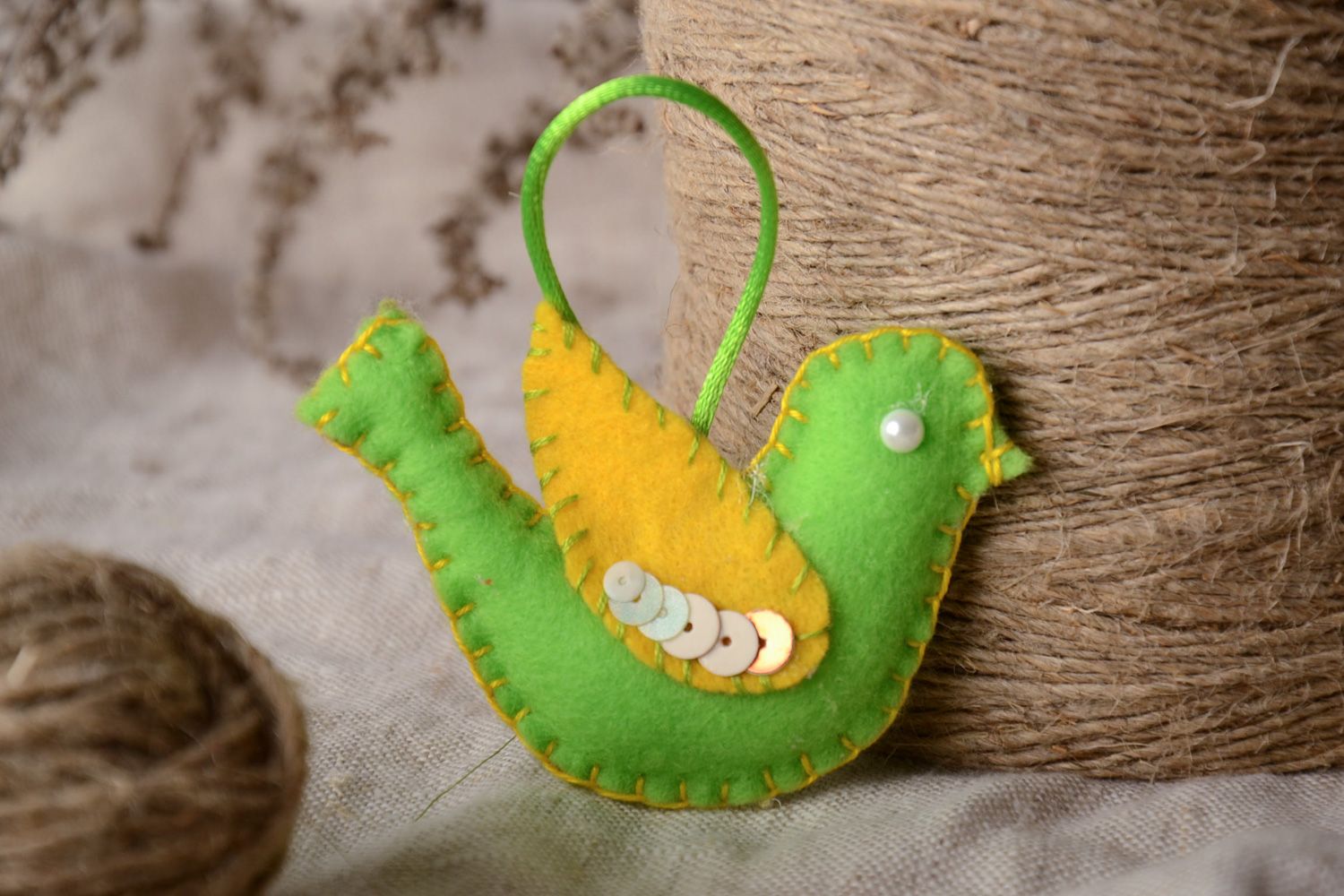 Handmade interior soft decoration sewn of fleece in the shape of bird of green color photo 1