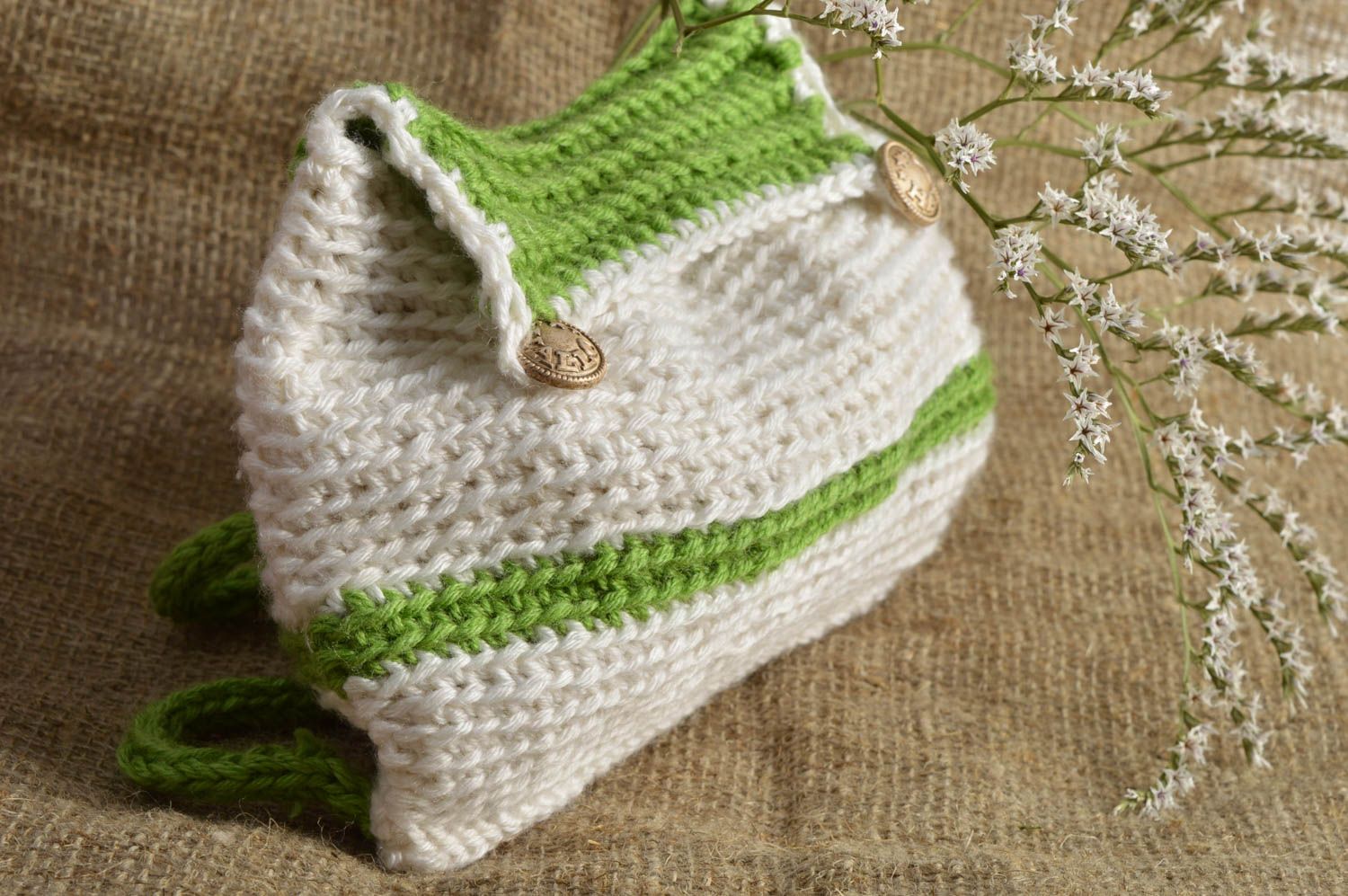 Children's handmade designer stylish crochet backpack of white and green colors photo 1