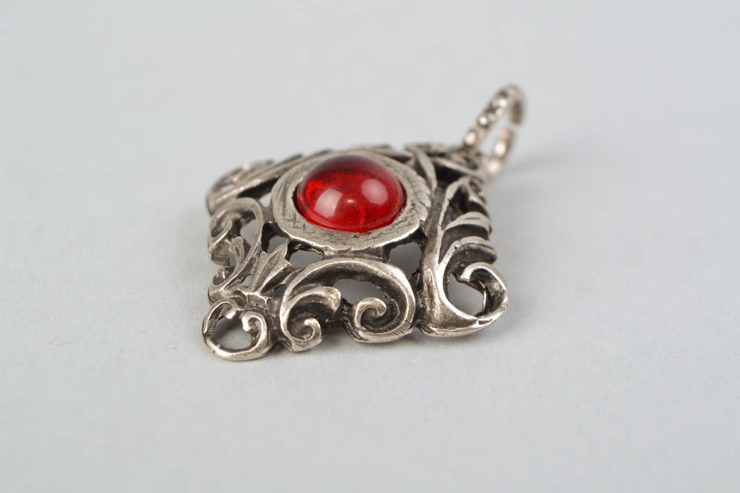 Metal pendant with red glass cabochon photo 4