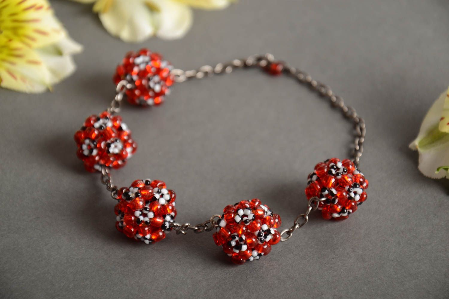 Handmade metal chain women's wrist bracelet with red and white bead woven balls photo 1