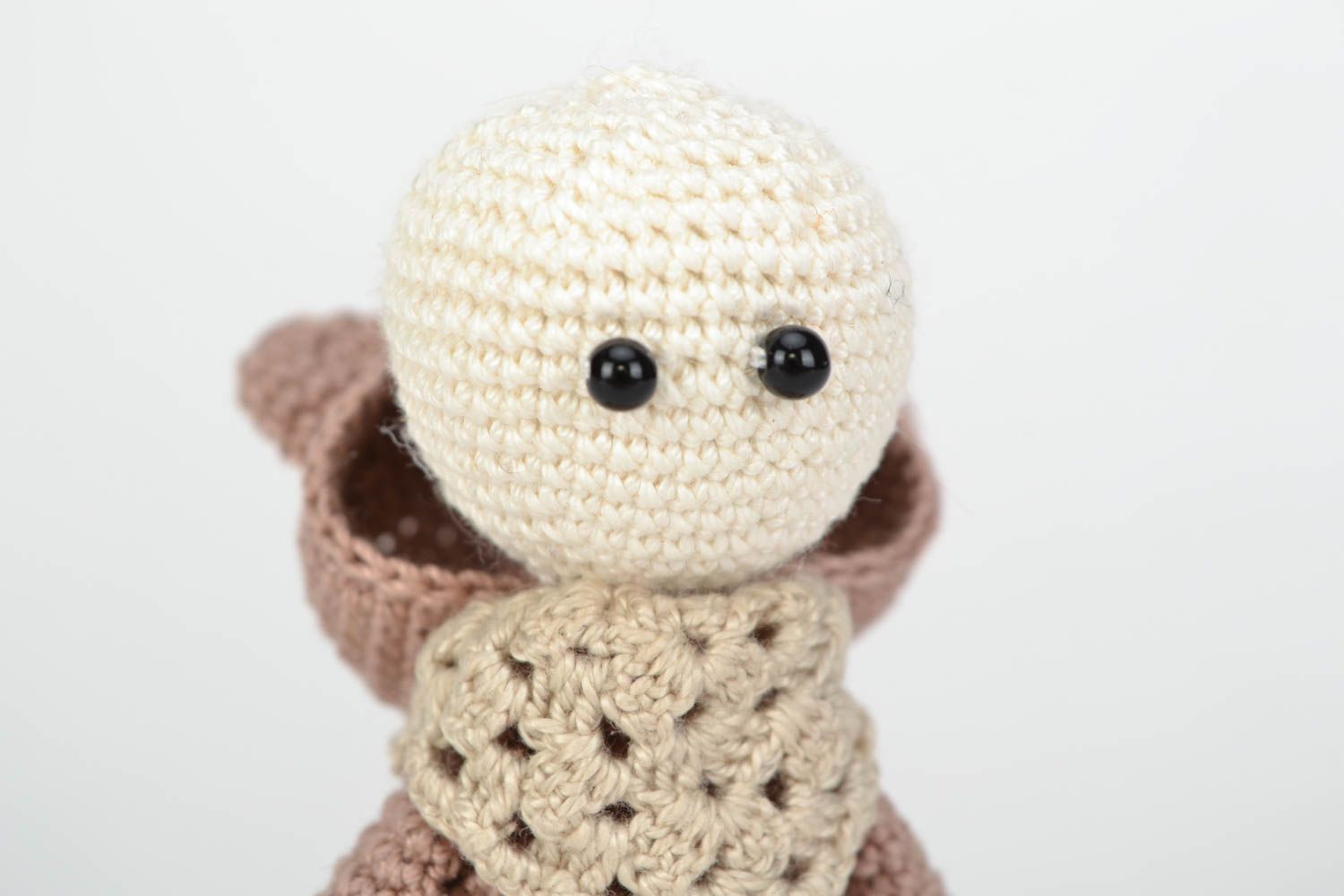 Small brown handmade crochet doll in the costume of bear photo 5