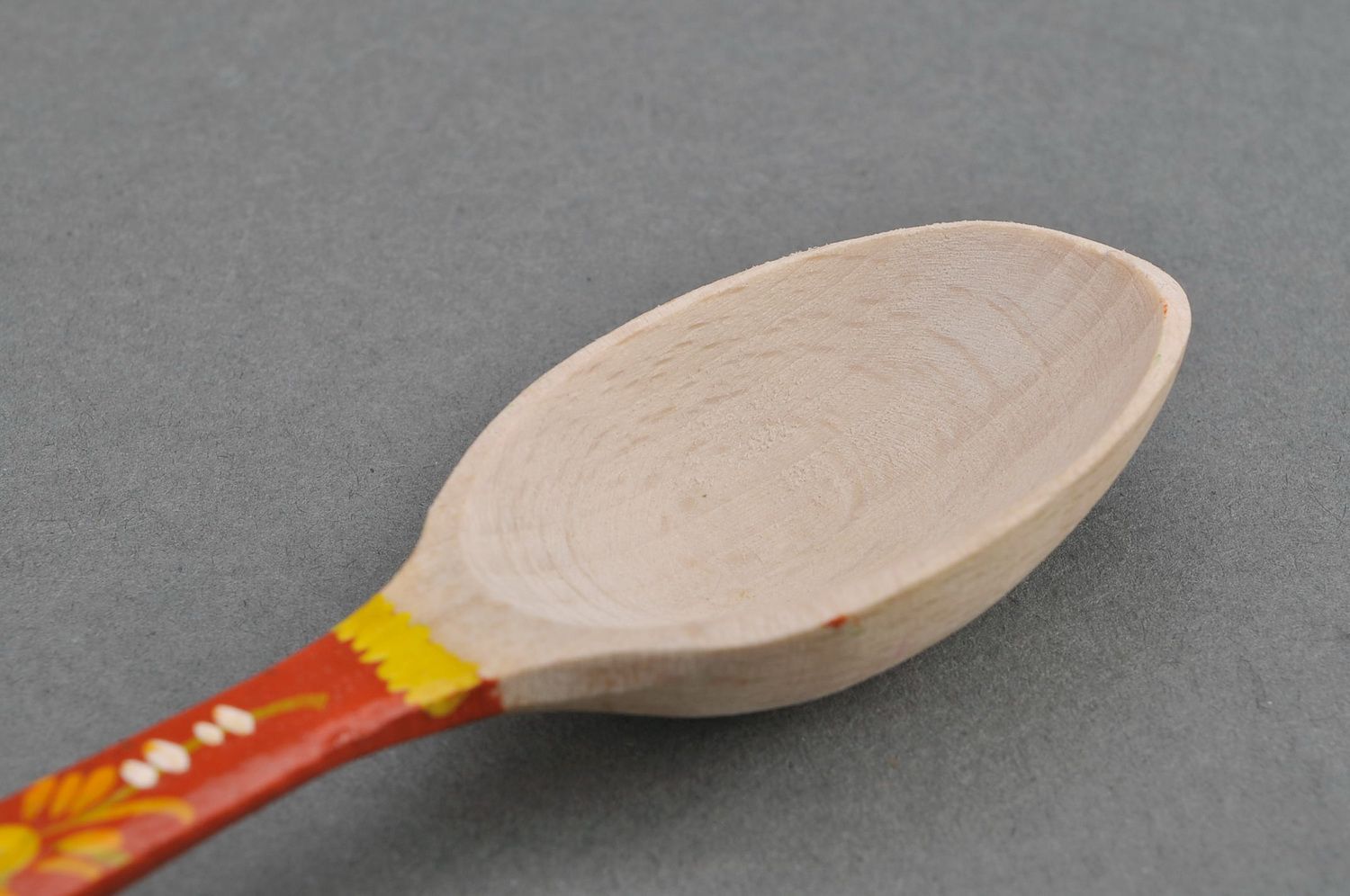 Wooden teaspoon with orange handle photo 3