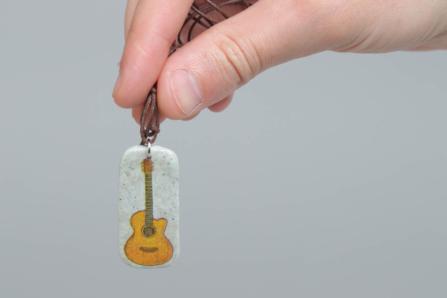 Handmade designer pendant made of polymer clay rectangular accessory with print photo 5
