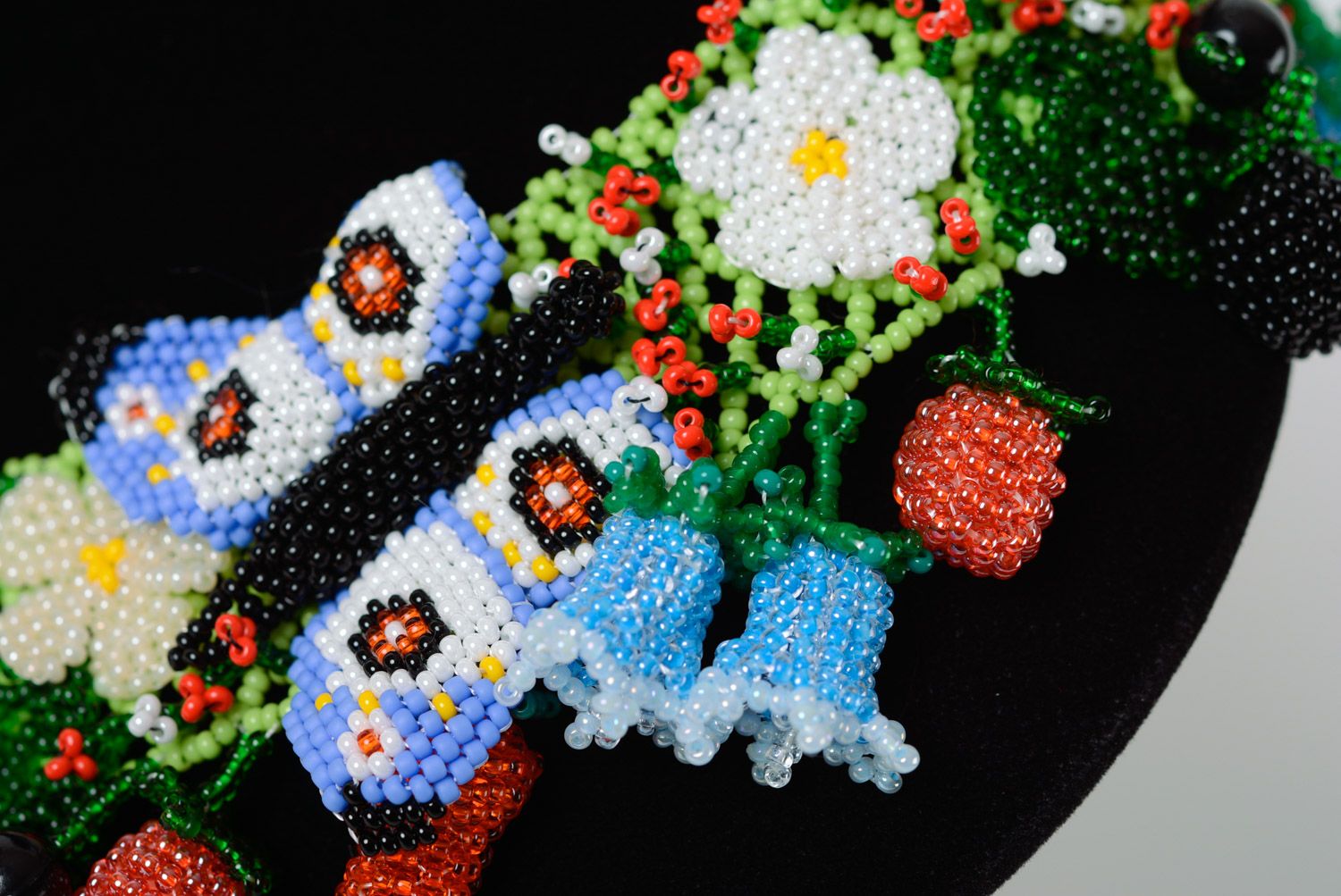 Massive colorful handmade necklace woven of beads with flowers and berries  photo 3