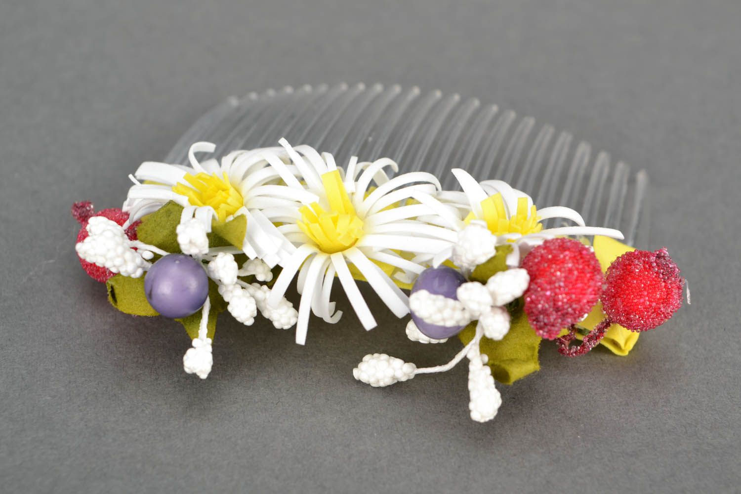 Plastic hair comb with artificial flowers photo 4