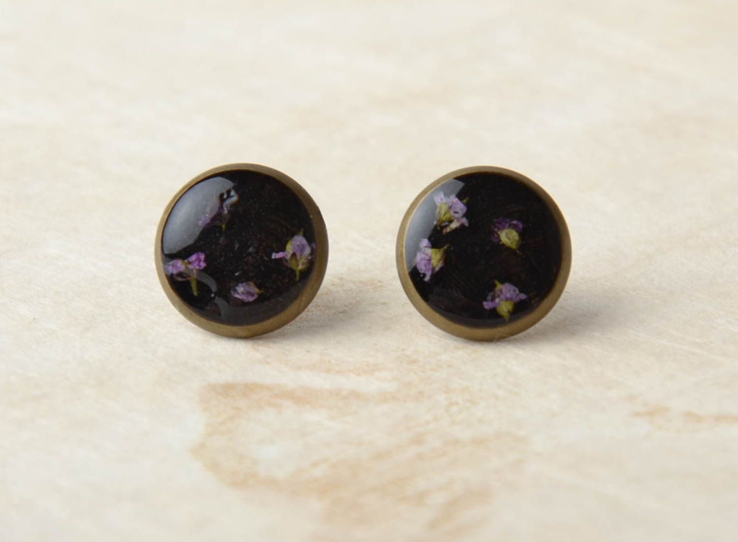 Metal earrings with natural flowers photo 1