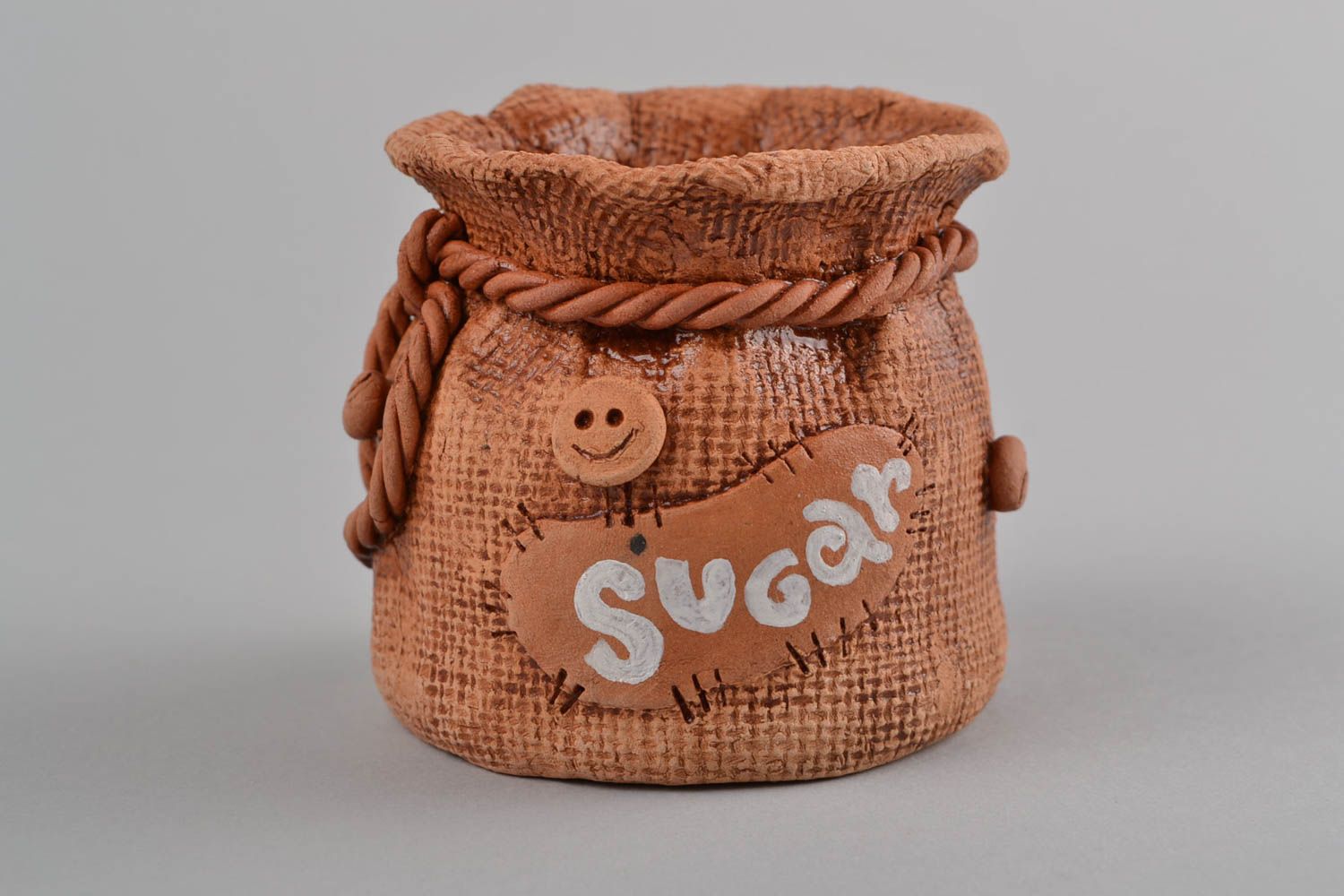 Clay small brown handmade pot for sugar in shape of sack  photo 3
