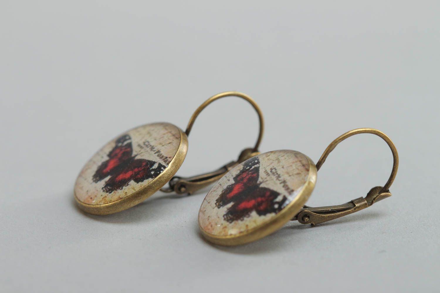 Handmade stylish beautiful earrings made of glassy glaze round with butterfly print photo 3