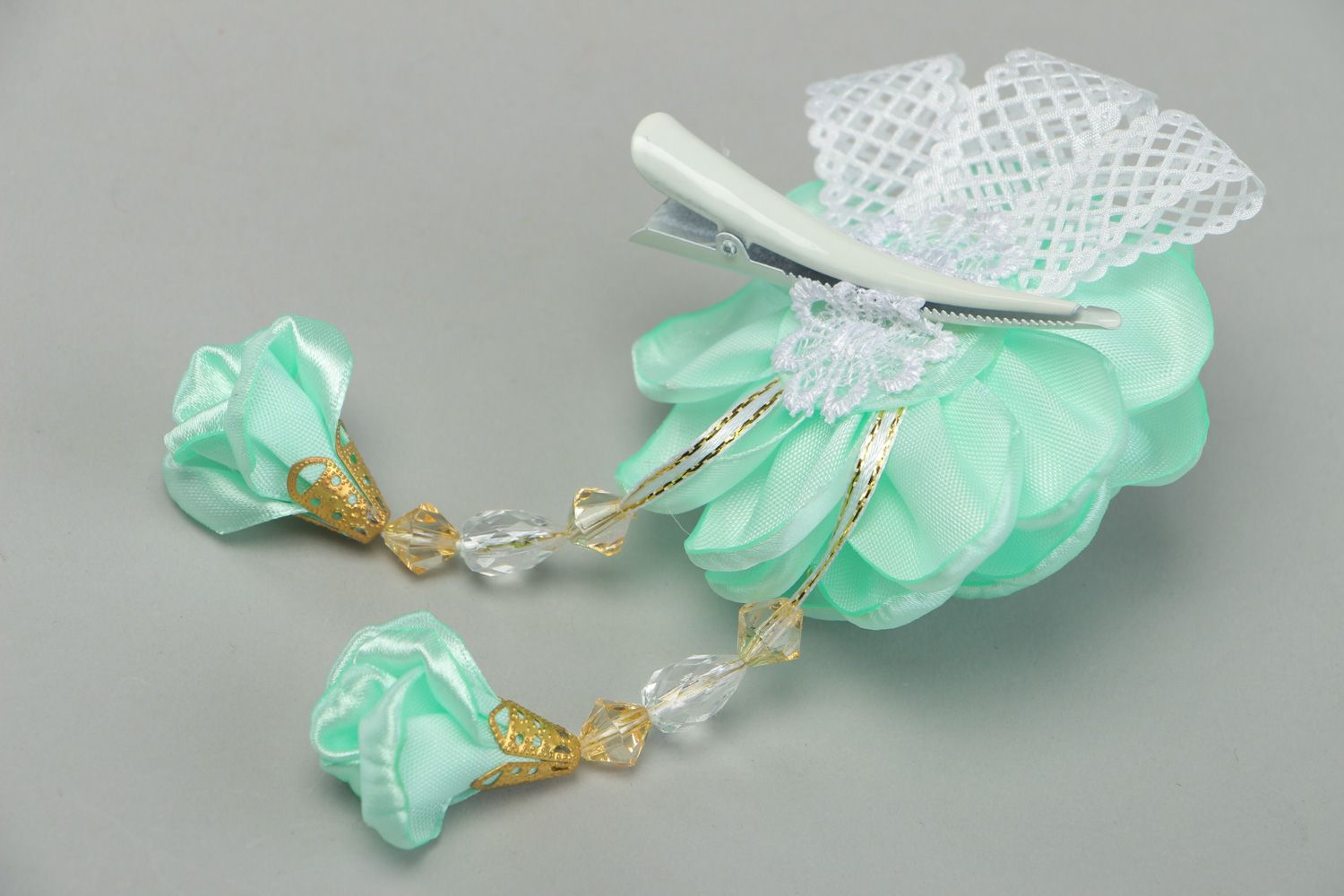 Handmade hair clip with flower made of satin ribbons of mint color and beads photo 3