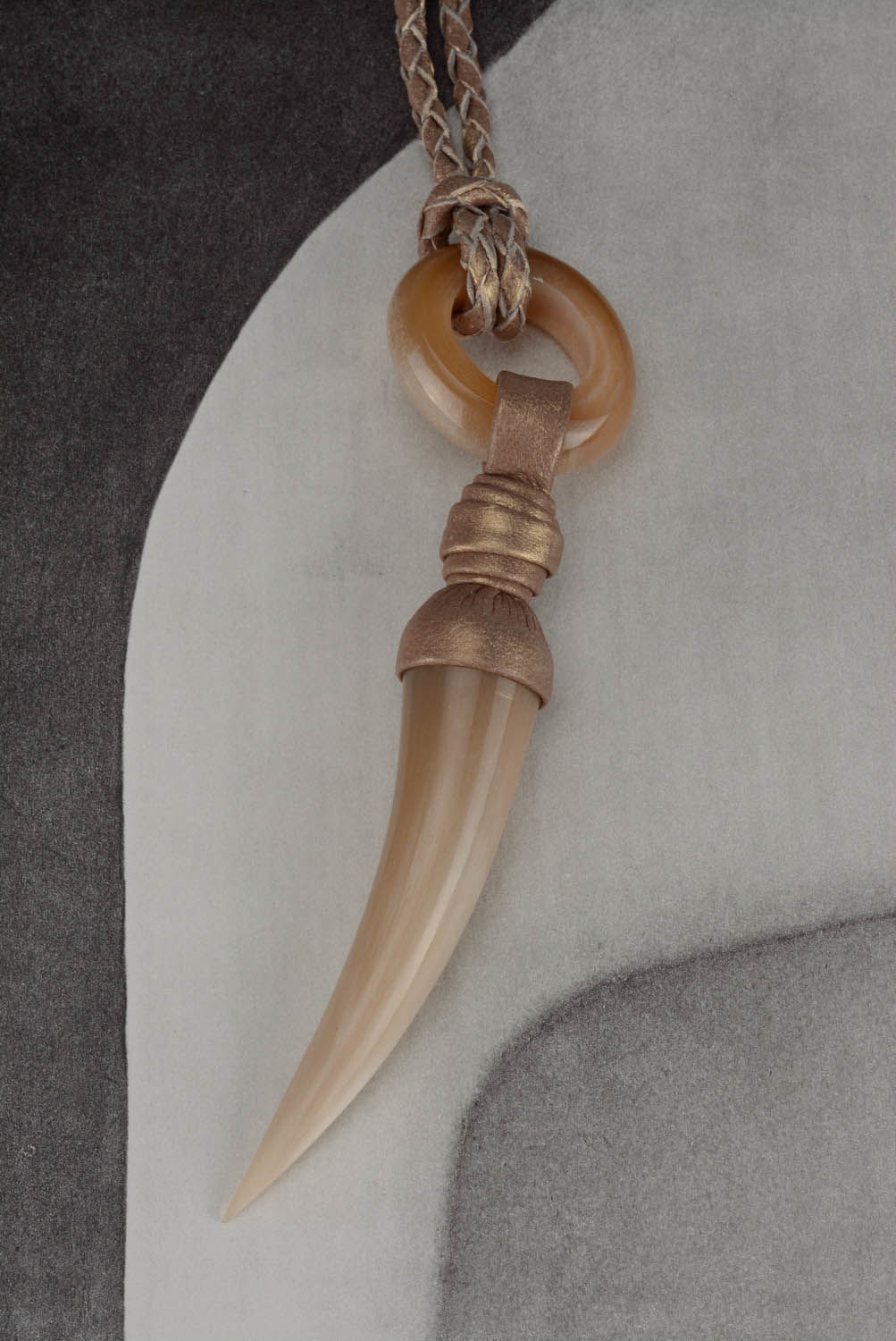 Pendant made of polished cow horn photo 3