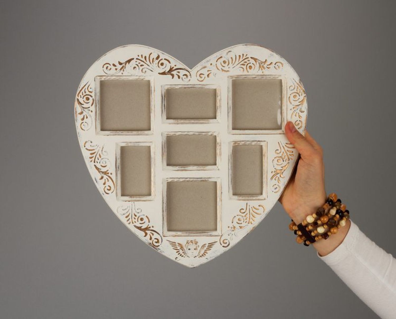 Cornice per foto di legno a forma di cuore fatta a mano Portaritratti di legno 
 foto 1
