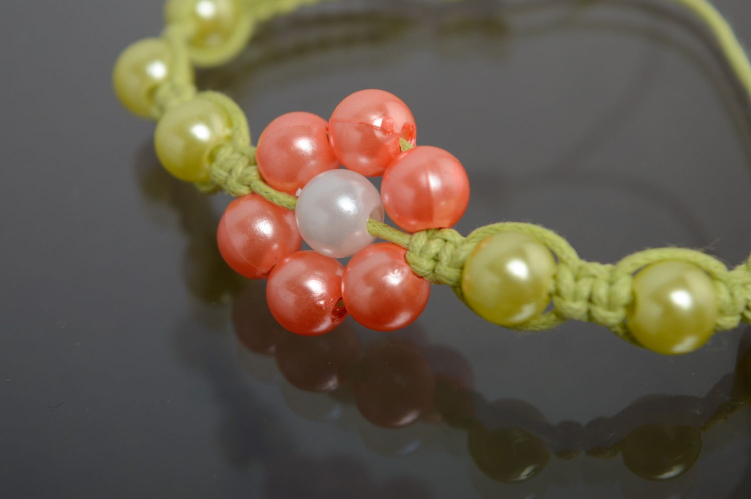 Woven macrame cord bracelet with ceramic beads photo 2