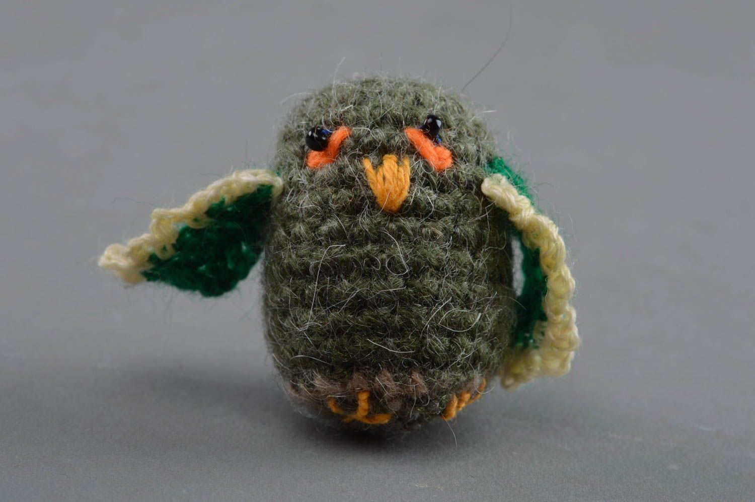 Beautiful handmade tiny crochet soft toy owl of green color for children photo 1