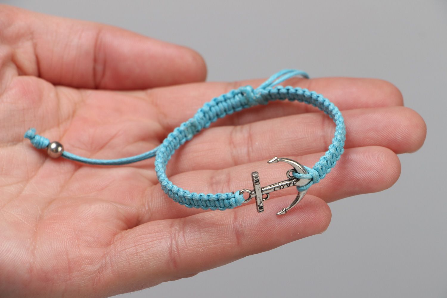 Handmade waxed cord wrist bracelet of blue color with metal charm Anchor for women photo 3