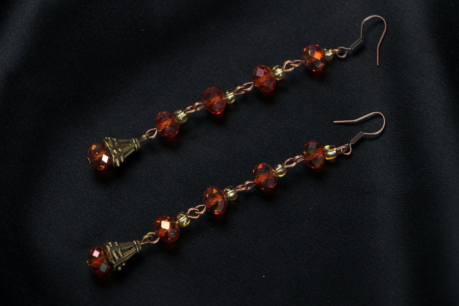 Earrings made ​​of crystal and metal photo 1