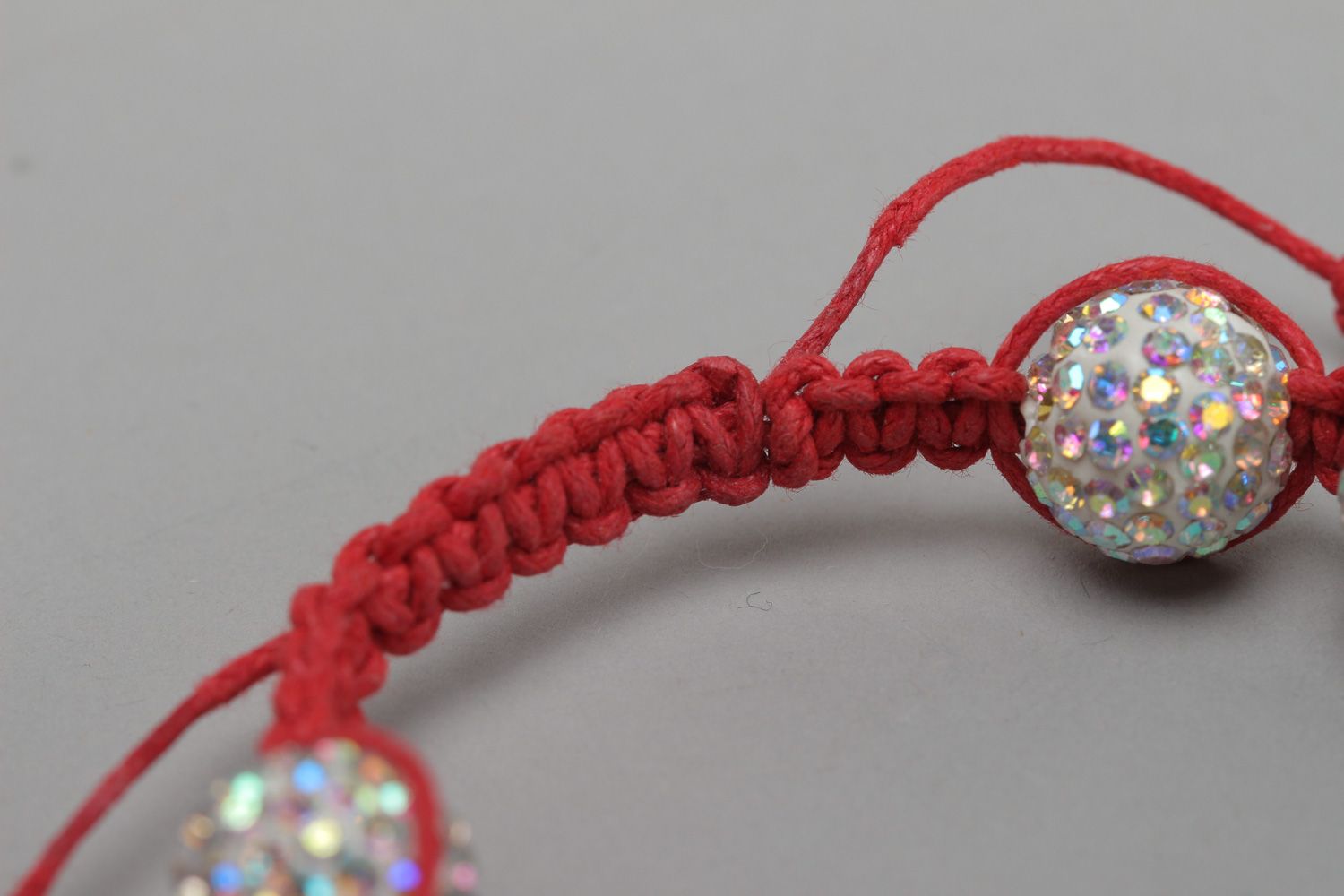 Handmade friendship wrist bracelet woven of red waxed cord with white beads  photo 4