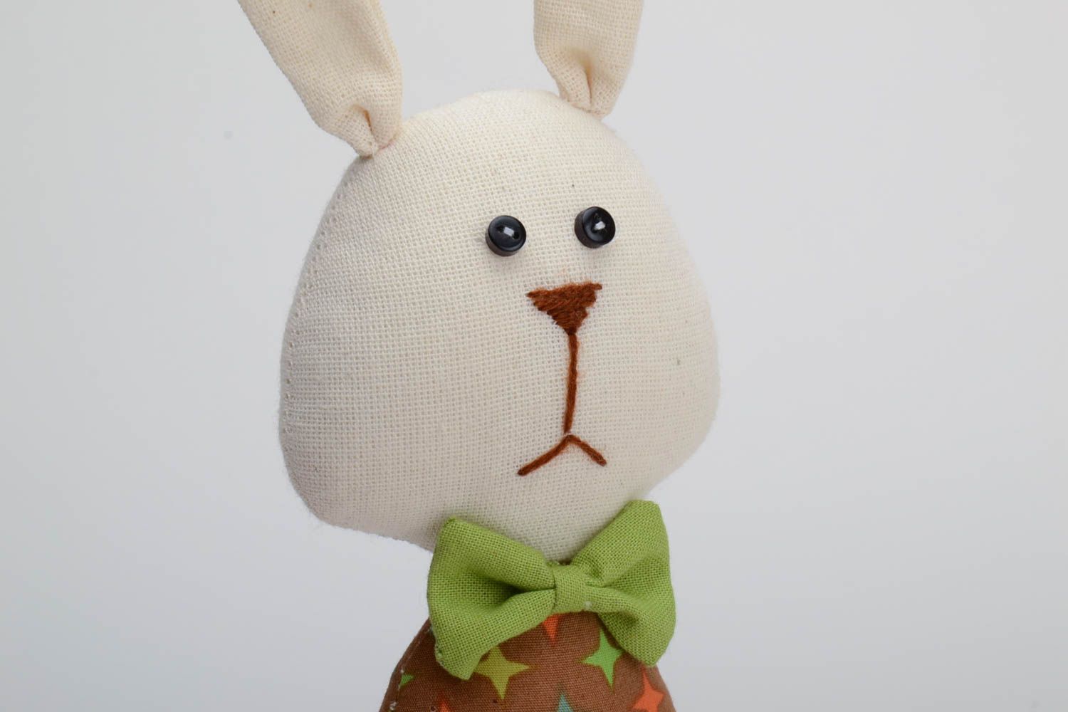 Handmade cotton fabric soft toy funny rabbit in colorful suit with green bow tie photo 3