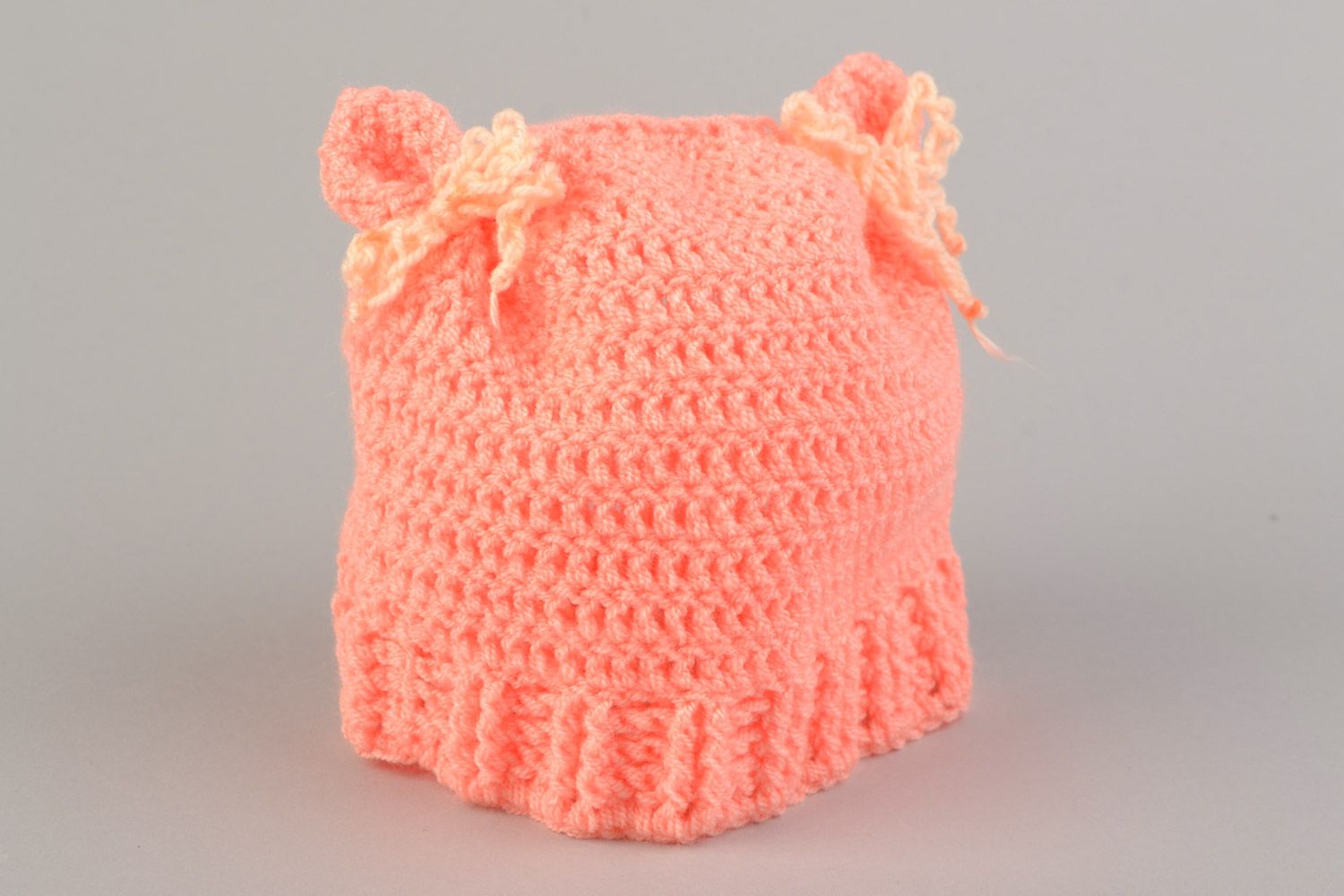 Handmade cute baby hat crocheted of pink acrylic threads with ears  photo 1