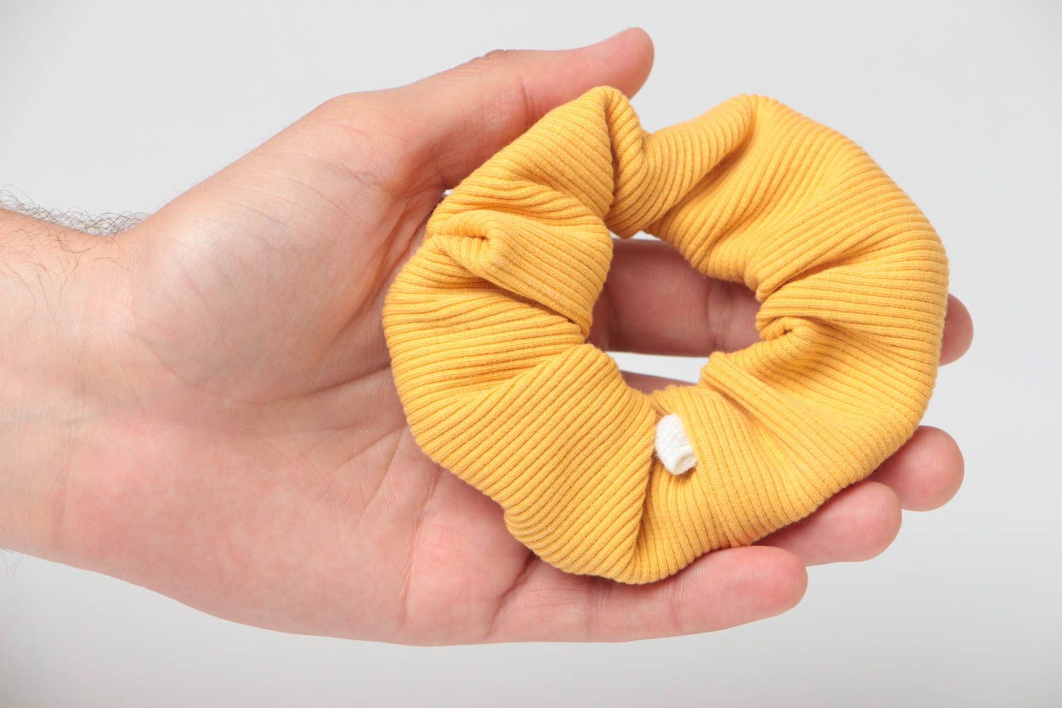 Handmade decorative stretch fabric hair tie of yellow color of laconic design photo 5