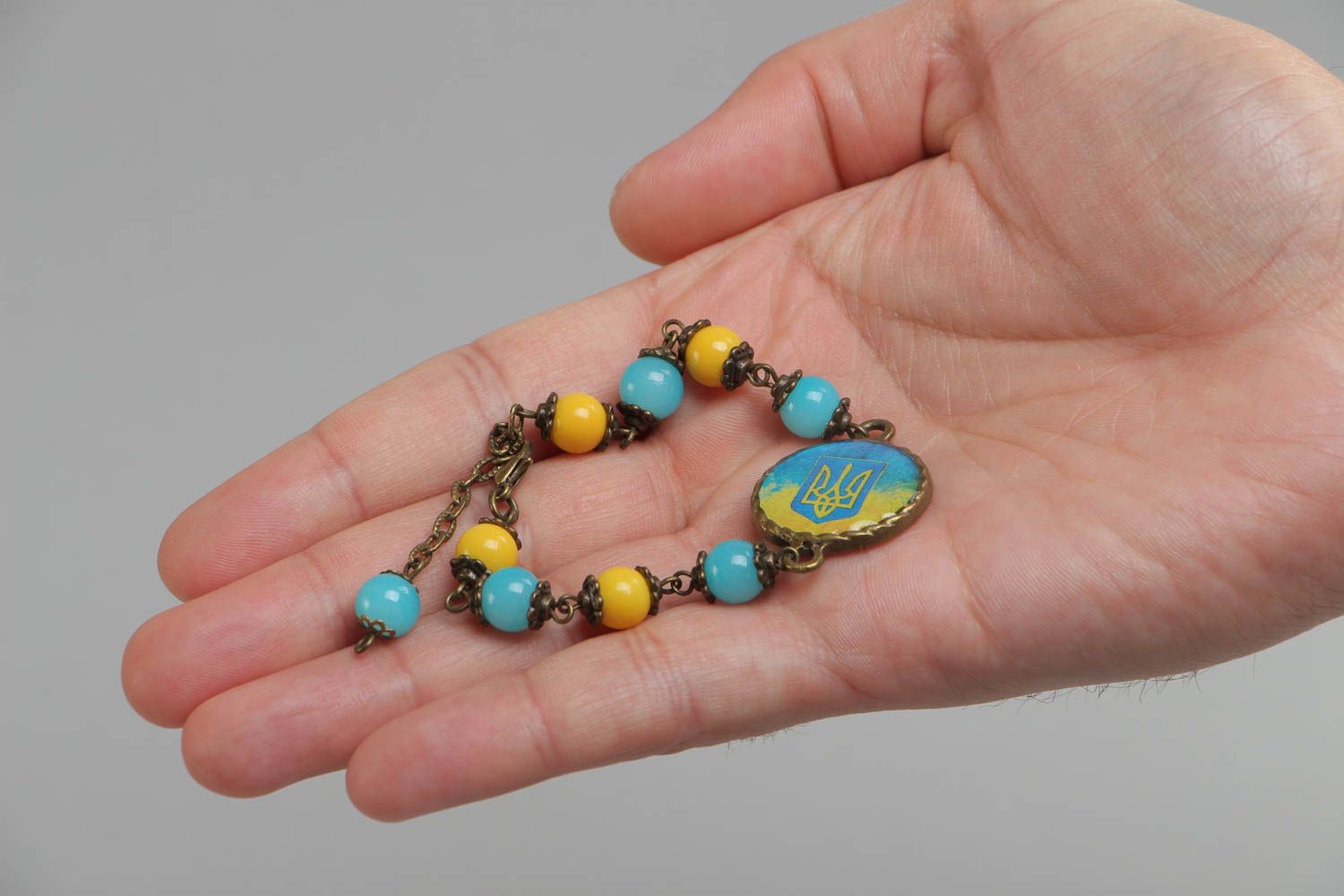 Handmade blue and yellow bright glass glaze wrist bracelet in Ukrainian style photo 5