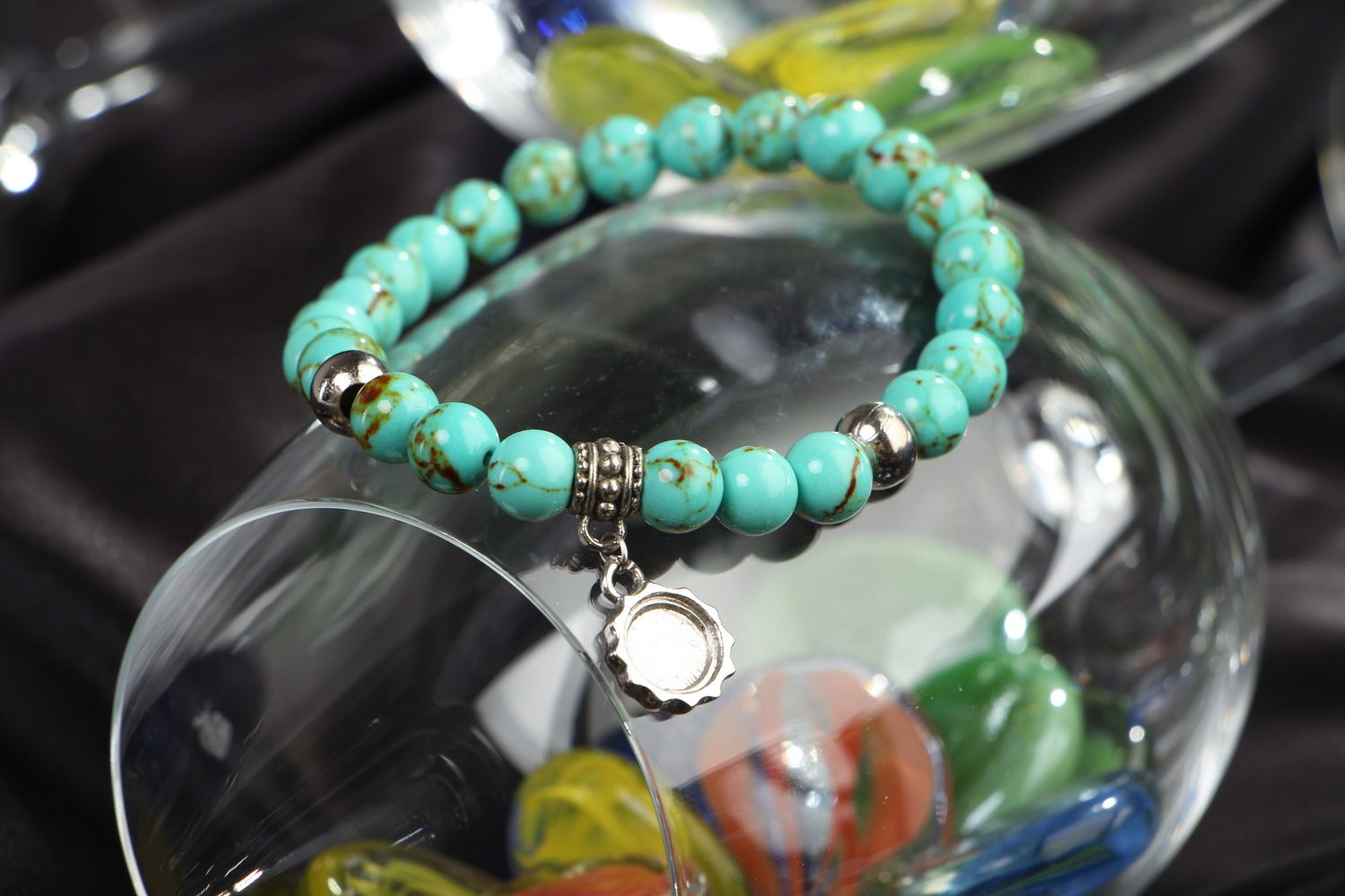 Handmade stretch wrist bracelet with natural turquoise beads and metal charm photo 4