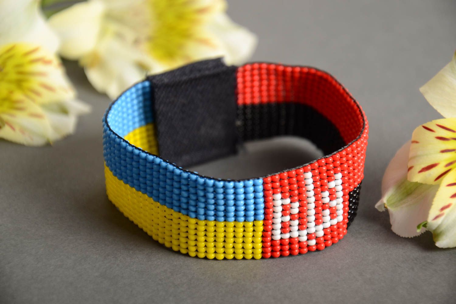 Handmade black and red yellow and blue bead woven flat wrist bracelet unisex photo 1