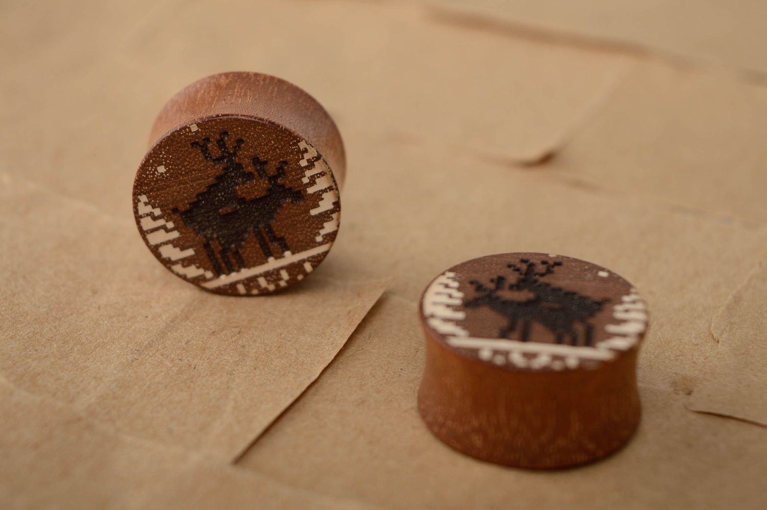 Unusual sapele wood ear plugs with engraving photo 1
