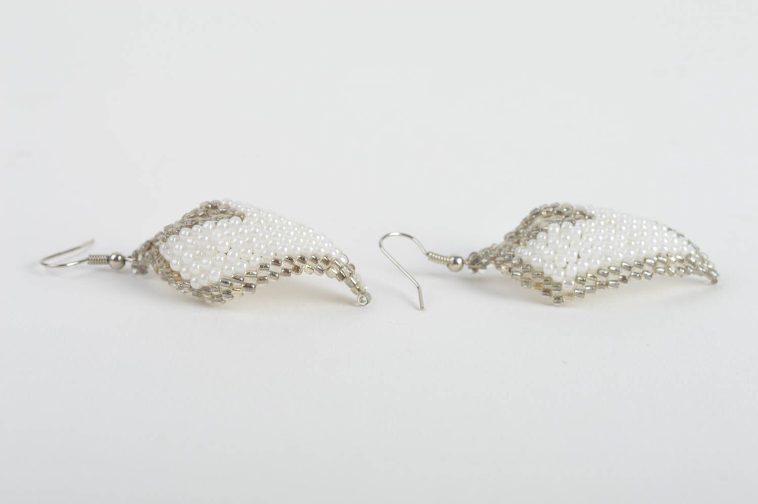 Handmade white and gray beaded woven dangle earrings in the shape of leaves photo 4