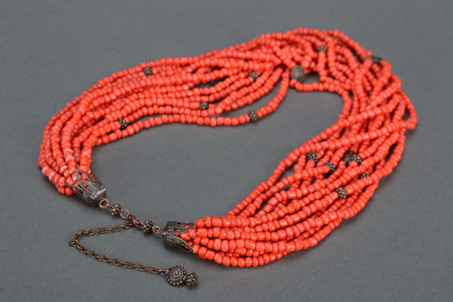 Beaded necklace of coral color photo 5