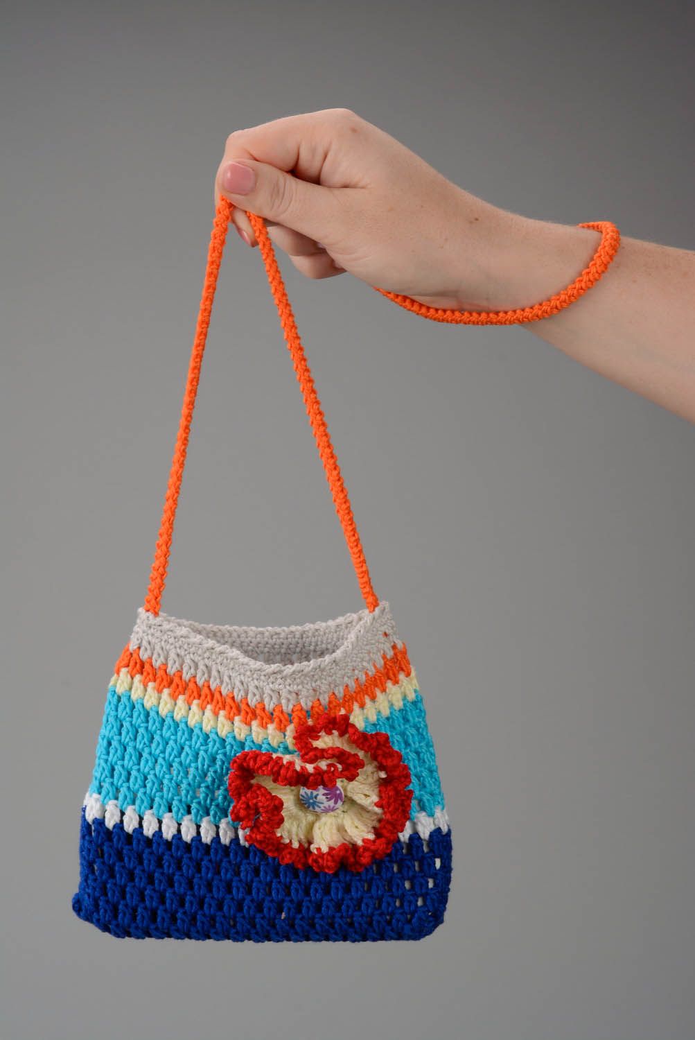 Crocheted bag with flower photo 1