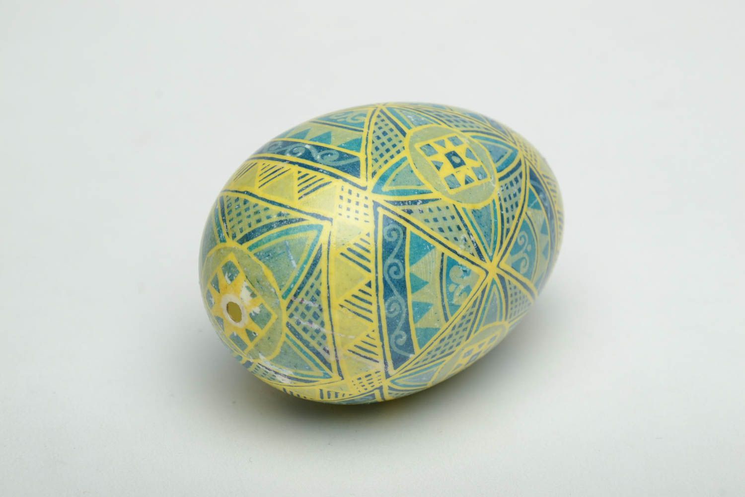 Easter egg with traditional symbolics painted with aniline dyes photo 3
