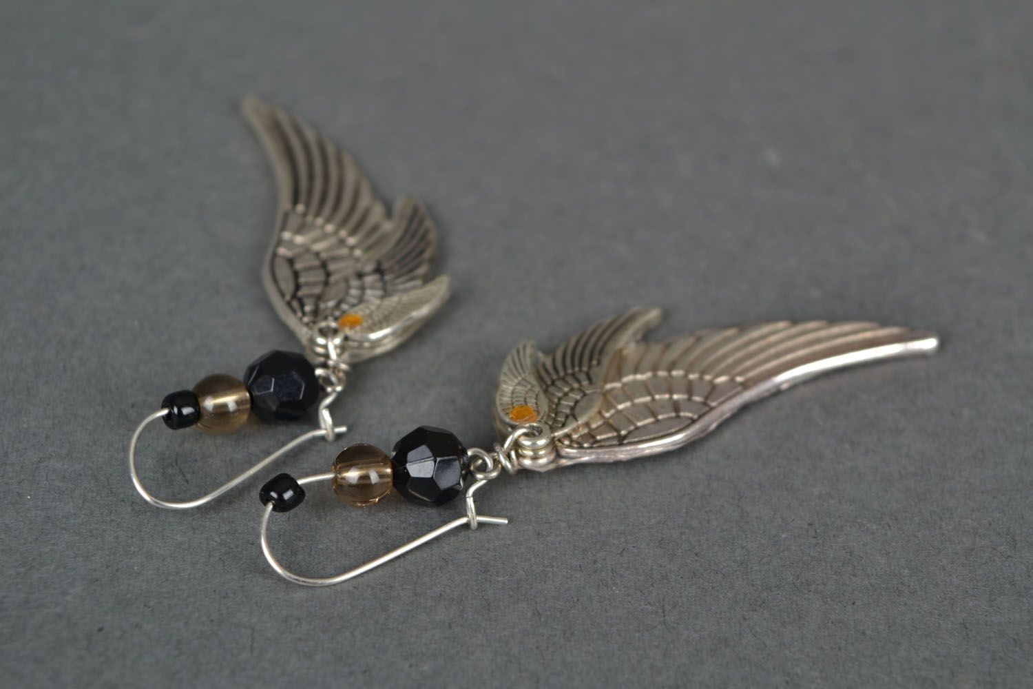 Metal earrings with charms Wings photo 2