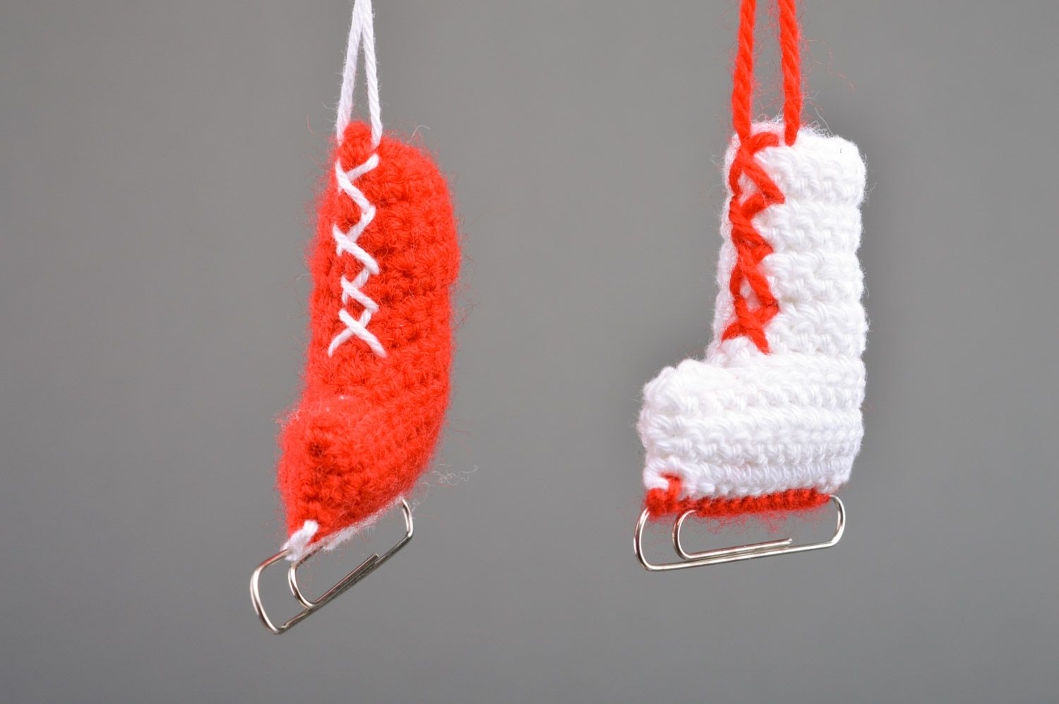 Unusual handmade crochet soft interior pendant in the shape of skates with paper clips photo 5