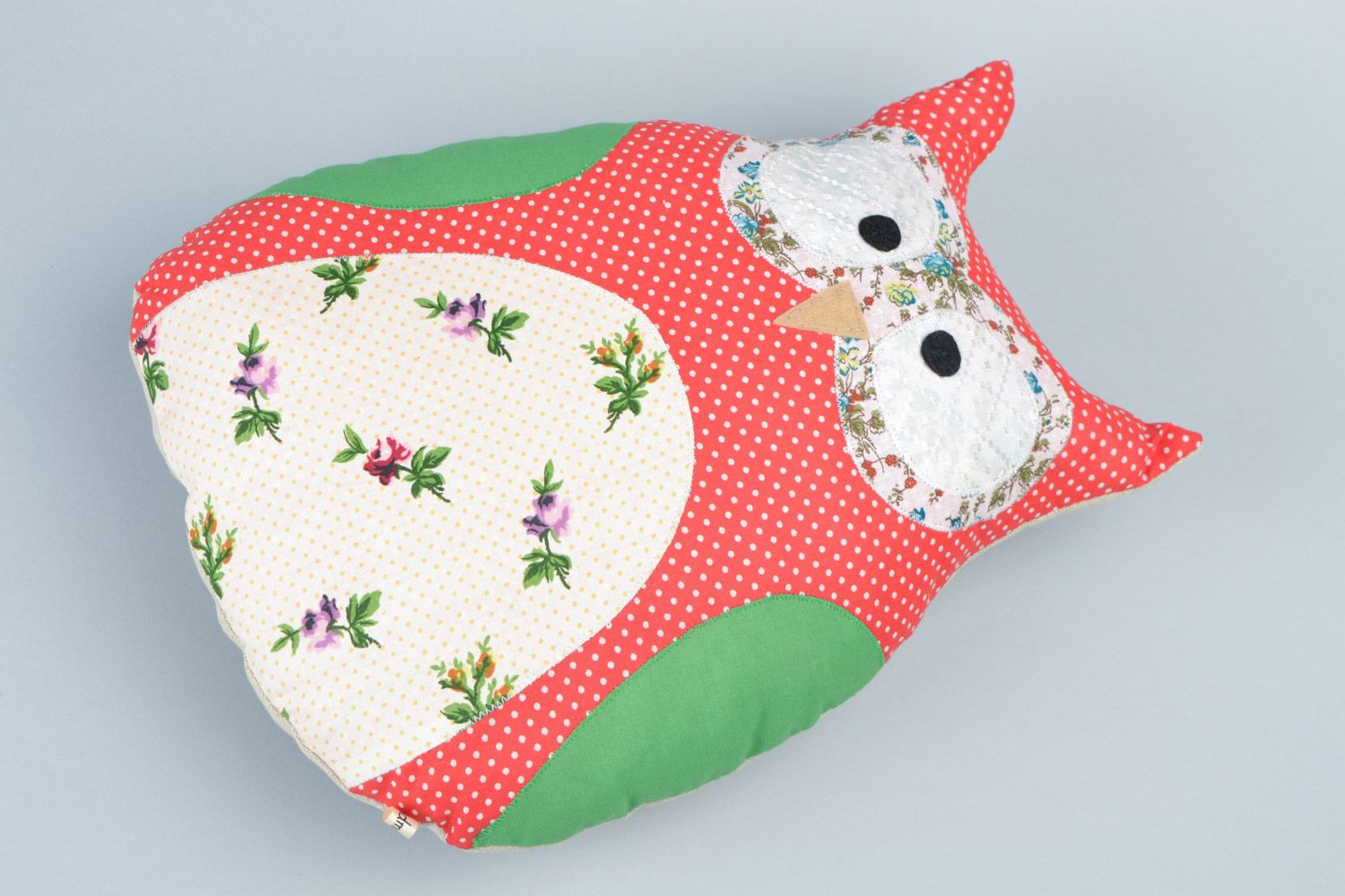 Handmade soft pillow pet sewn of cotton fabric in the shape of colorful owl photo 3
