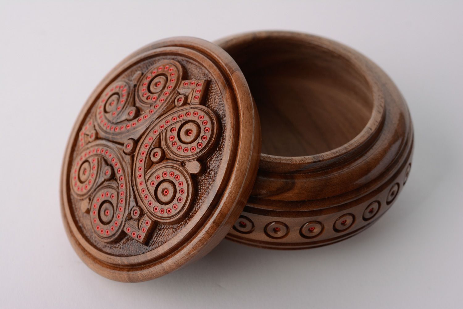 Round handmade jewelry box carved of wood and inlaid with beads on legs photo 1