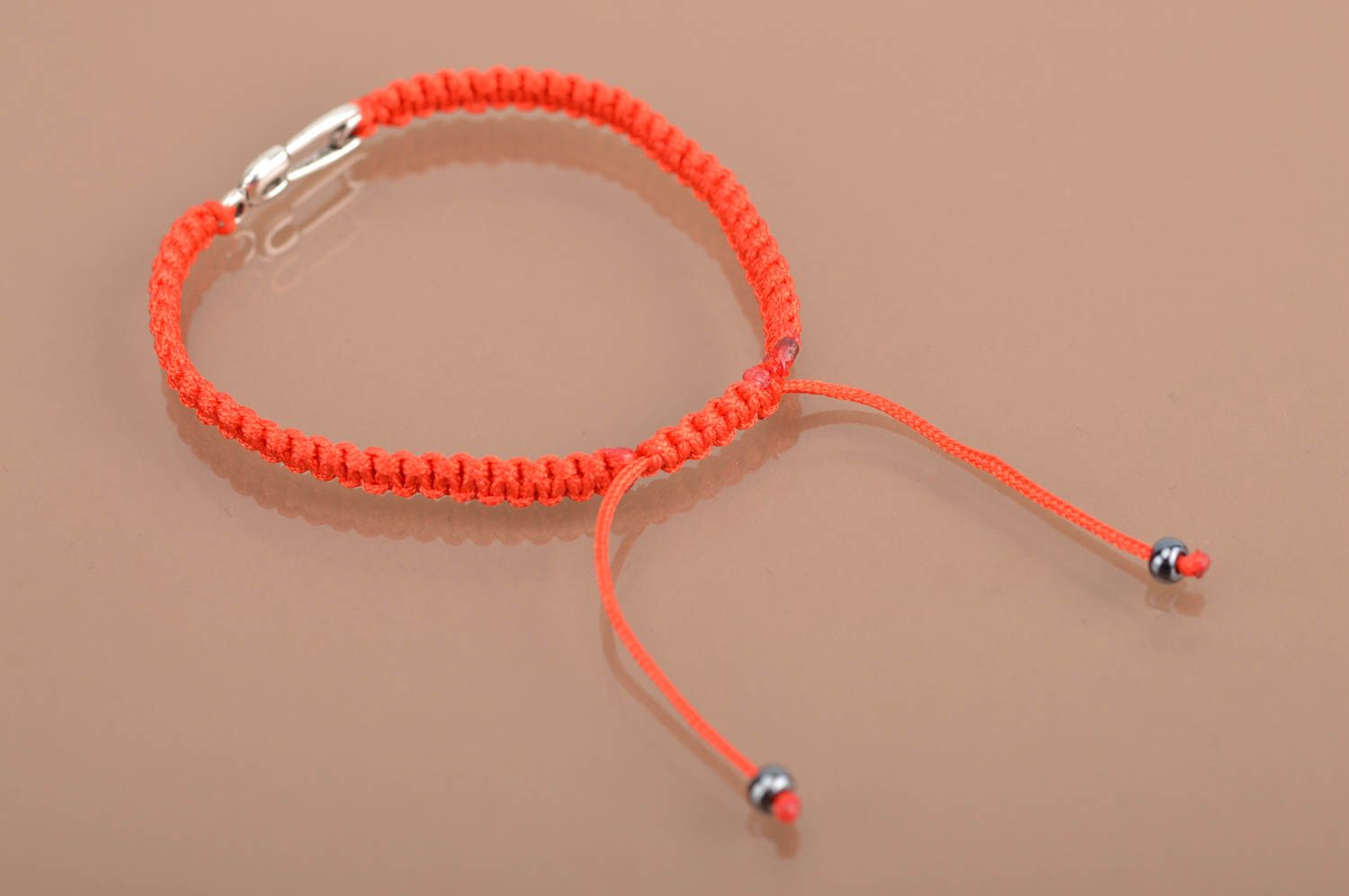 Beautiful handmade cute red wrist bracelet made of silk threads on strings photo 5