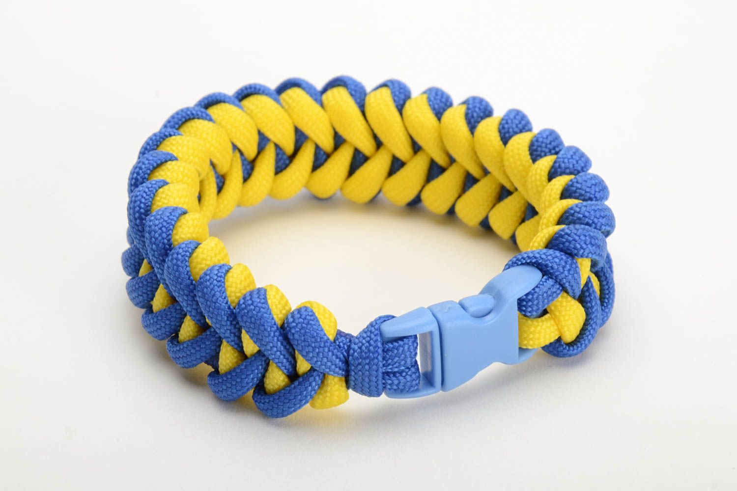 Handmade braided bracelet made of parachute cord blue and yellow unisex accessory photo 3