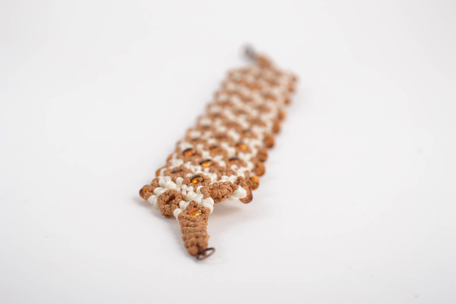 Handmade designer macrame wrist bracelet woven of synthetic threads with beads photo 4