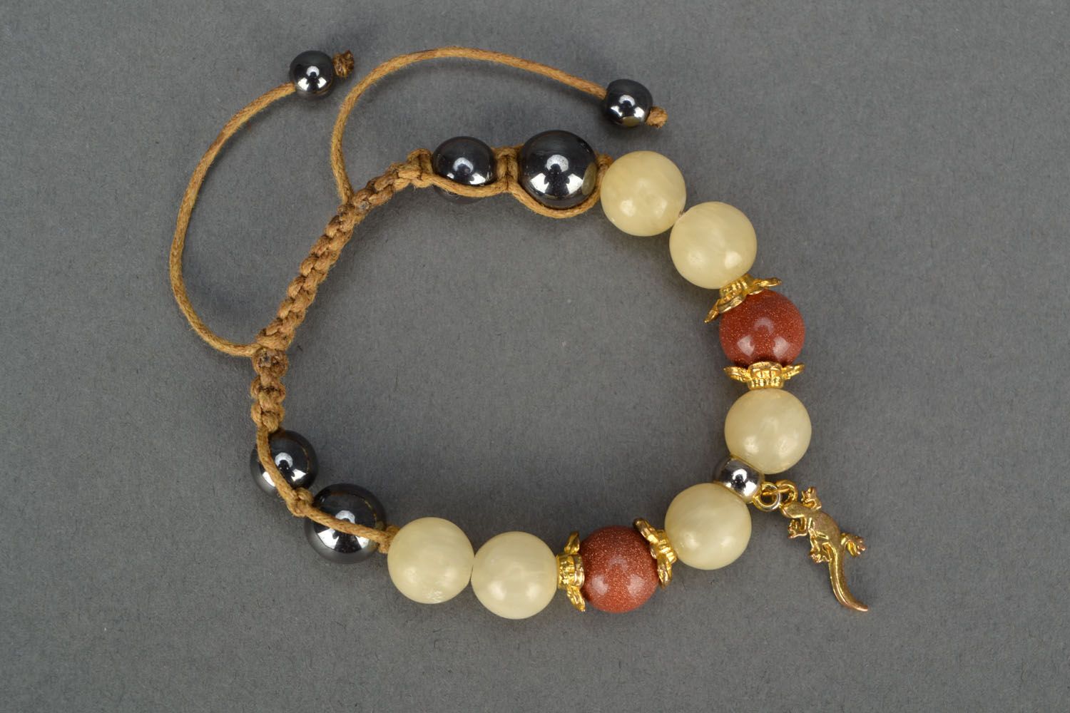Bracelet with natural stones and cord photo 2
