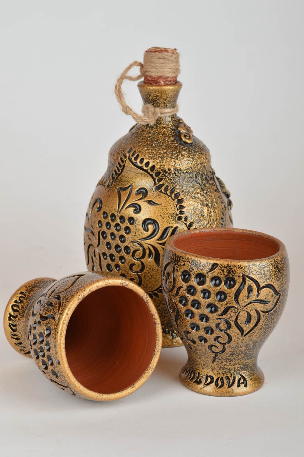 Juego de cerámica garrafa de arcilla de 750 ml y vasos decorativos dorados foto 5