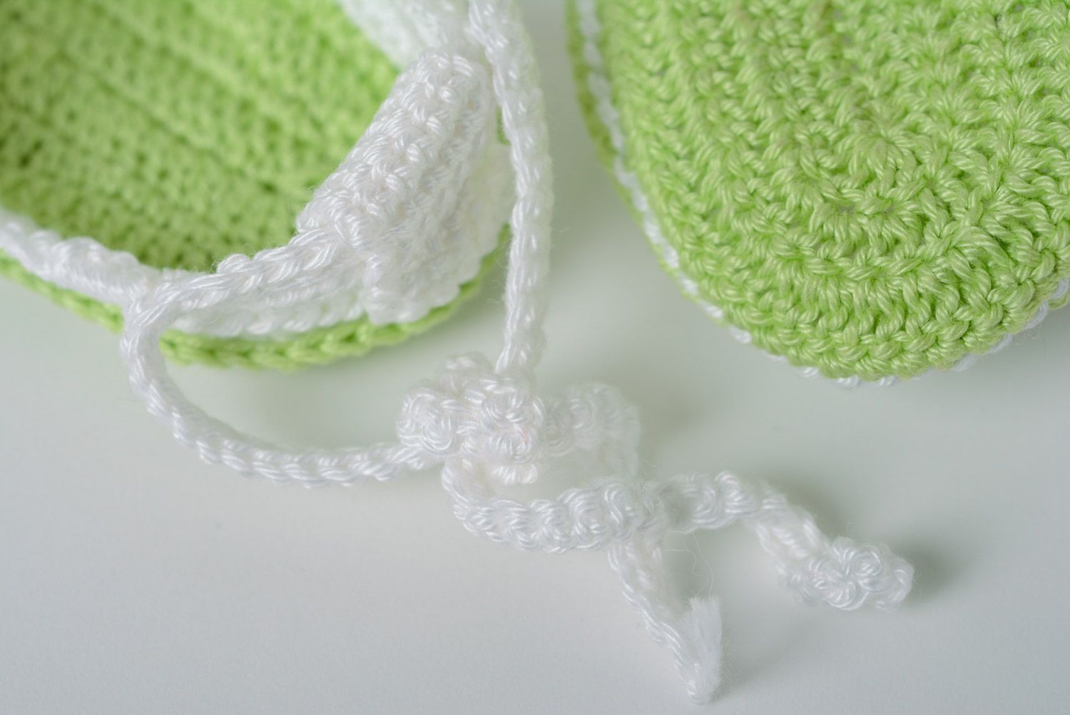Handmade summer baby booties crocheted of white and green acrylic threads for girl photo 5