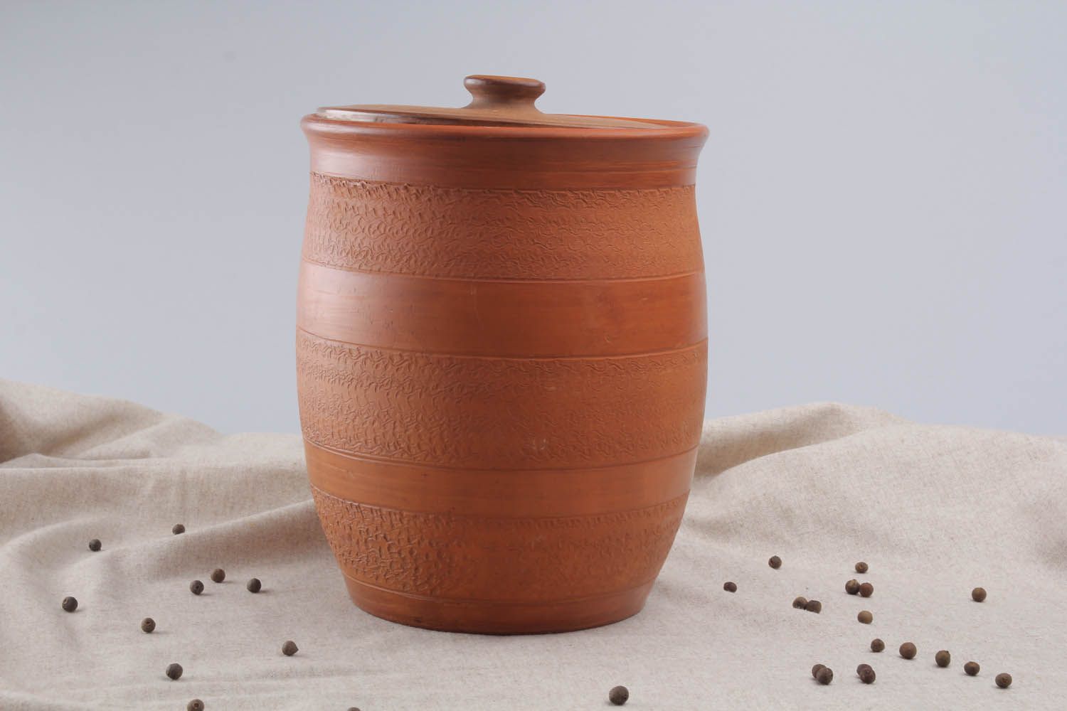 Handmade clay pot with a lid photo 1