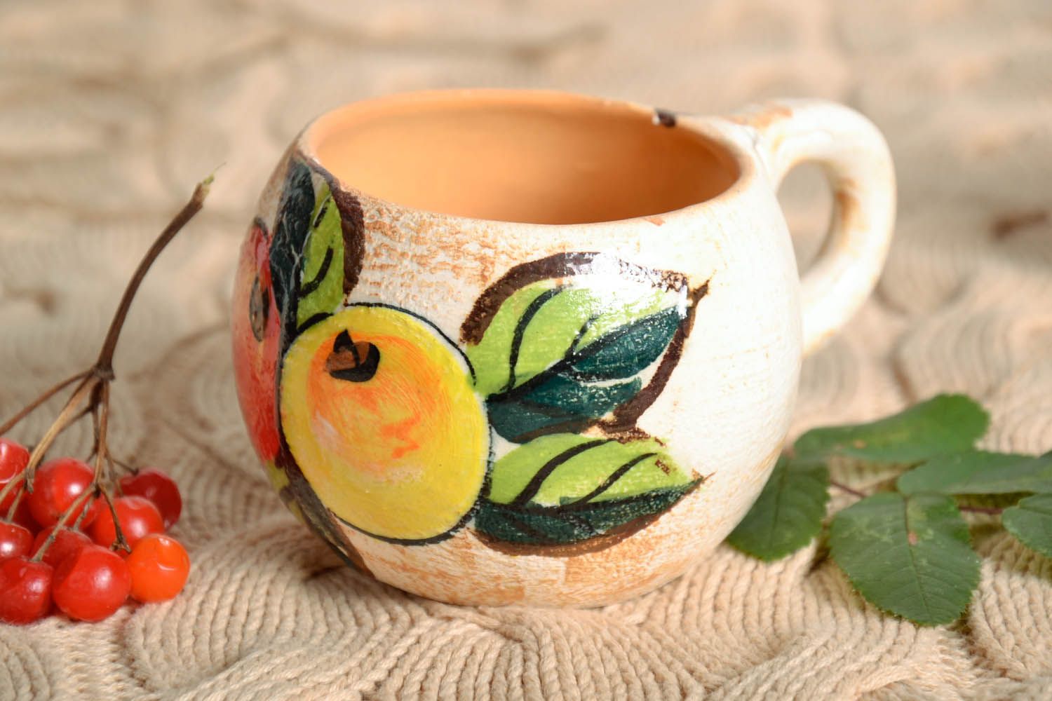 Ceramic art coffee or tea cup in white and green color with Apples pattern  photo 1